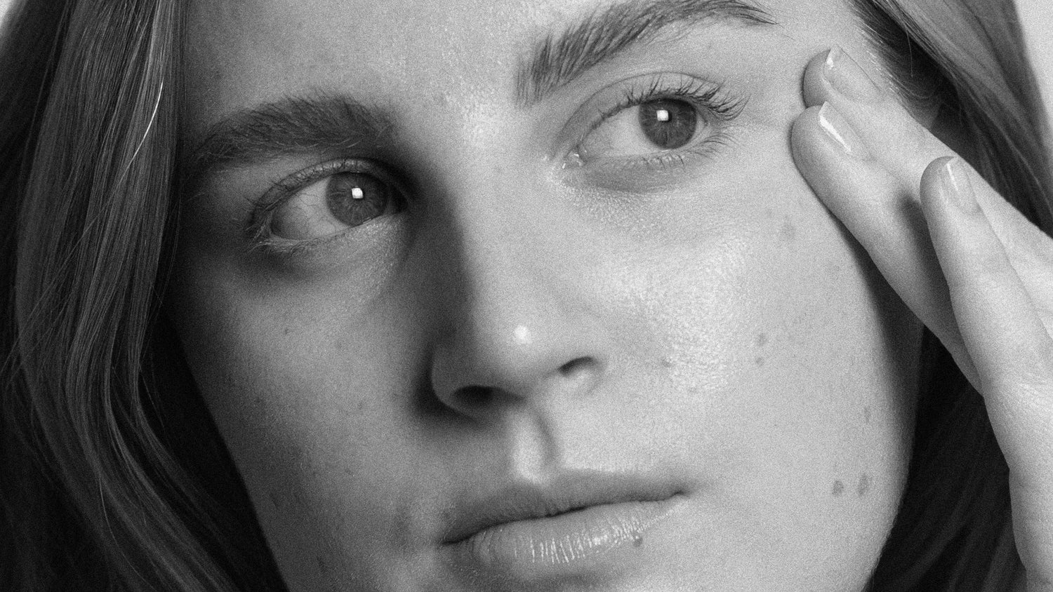 woman applying skincare